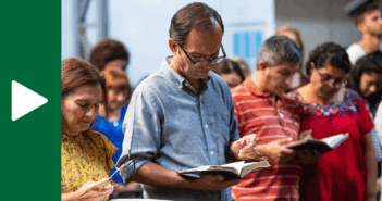 Group of people reading the Bible