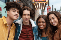 Young adult friends posing while out in the city