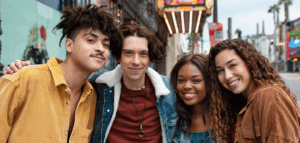 Young adult friends posing while out in the city