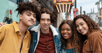 Young adult friends posing while out in the city