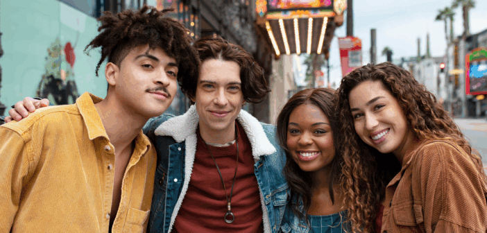 Young adult friends posing while out in the city
