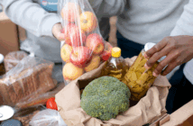 Close up volunteers collecting food donations
