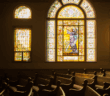 Photo of a church chapel and stained glass windows