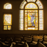 Photo of a church chapel and stained glass windows
