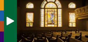 Photo of a church chapel and stained glass windows