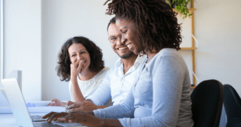 A person mentoring volunteers