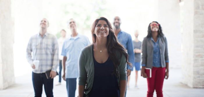 Diverse group looking up toward God