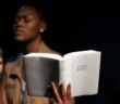 Female pastor holding the Bible