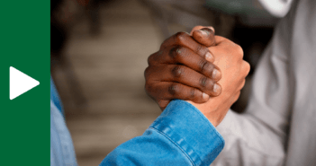 Two hands clenched in appreciation
