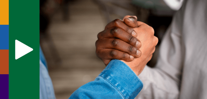 Two hands clenched in appreciation