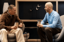 A pastor listening to a person during a conversation