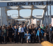 President Obama, congressman John Lewis, former President George W. Bush, and Civil Rights Movement veterans and other commemoration attendees marching across the Edmund Pettus Bridge in March 2015.