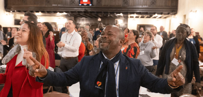 Bishop Ande Emmanuel of Nigeria sings during worship at the United Methodist Leadership Gathering at Knox United Church in Calgary, Canada. Photo by Mike DuBose, UM News.